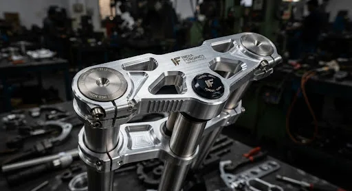 Forged aluminum motorcycle triple clamp with brushed industrial finish